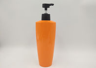 Le cosmétique en plastique d'ANIMAL FAMILIER orange ovale met la surface en bouteille vide de lustre de bouteille de savon de lotion