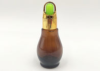 bouteilles cosmétiques en verre de la couleur 30ml ambre avec le chapeau d'or pour l'huile essentielle