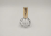 Bouteille en verre de jet de parfum d'or de pompe ronde avec l'impression adaptée aux besoins du client de logos